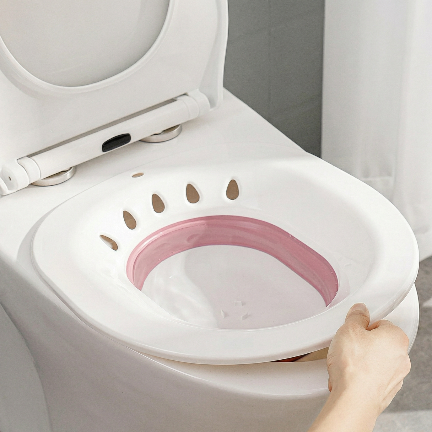 Dámská toaletní pomůcka pro hygienu a asistenci pro seniory